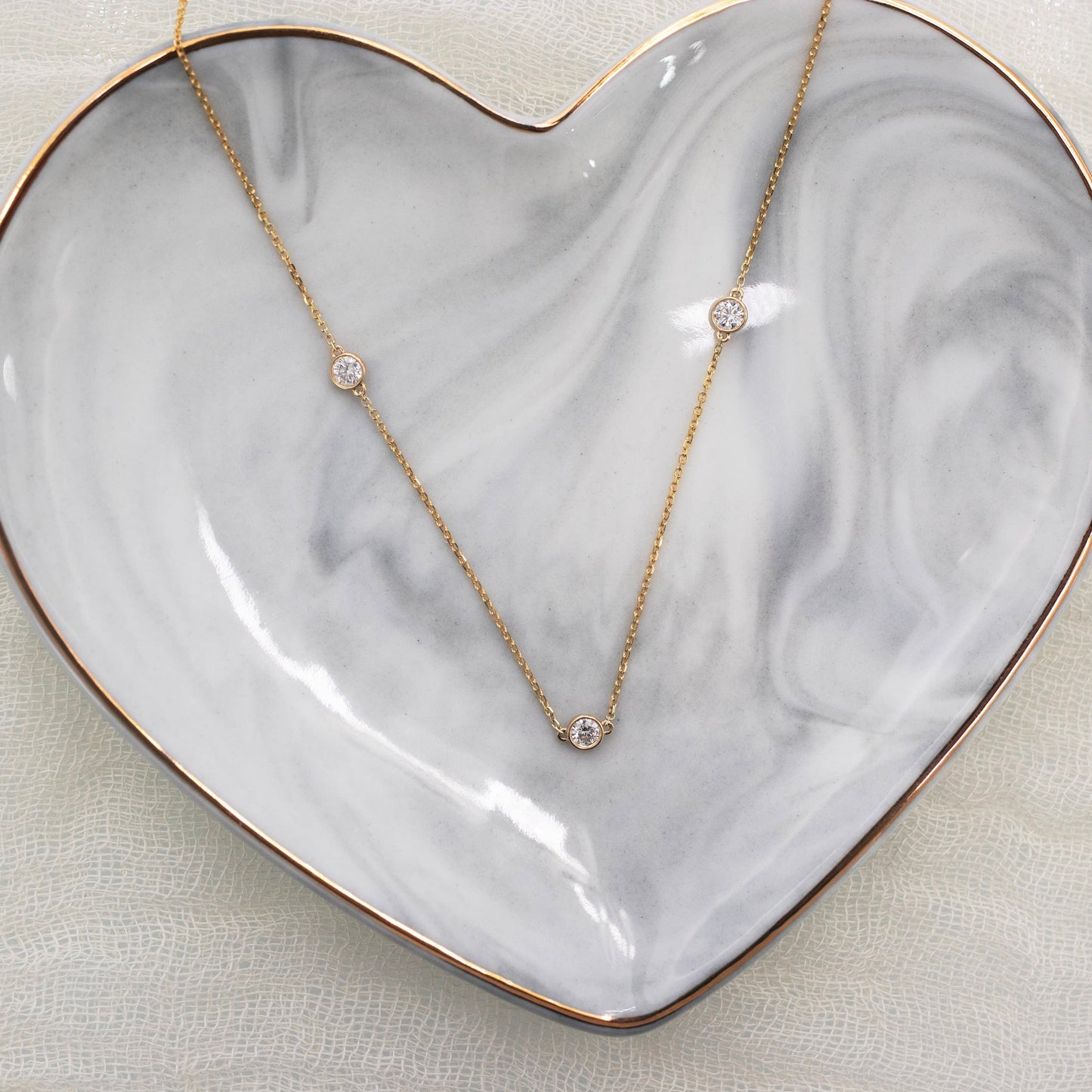 Triple Bezel Necklace with 0.50 TCW Floating Round Cut Moissanite