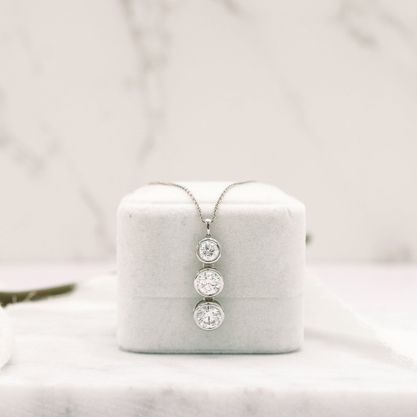 Triple Bezel Necklace with 0.60 TCW Round Cut Moissanite