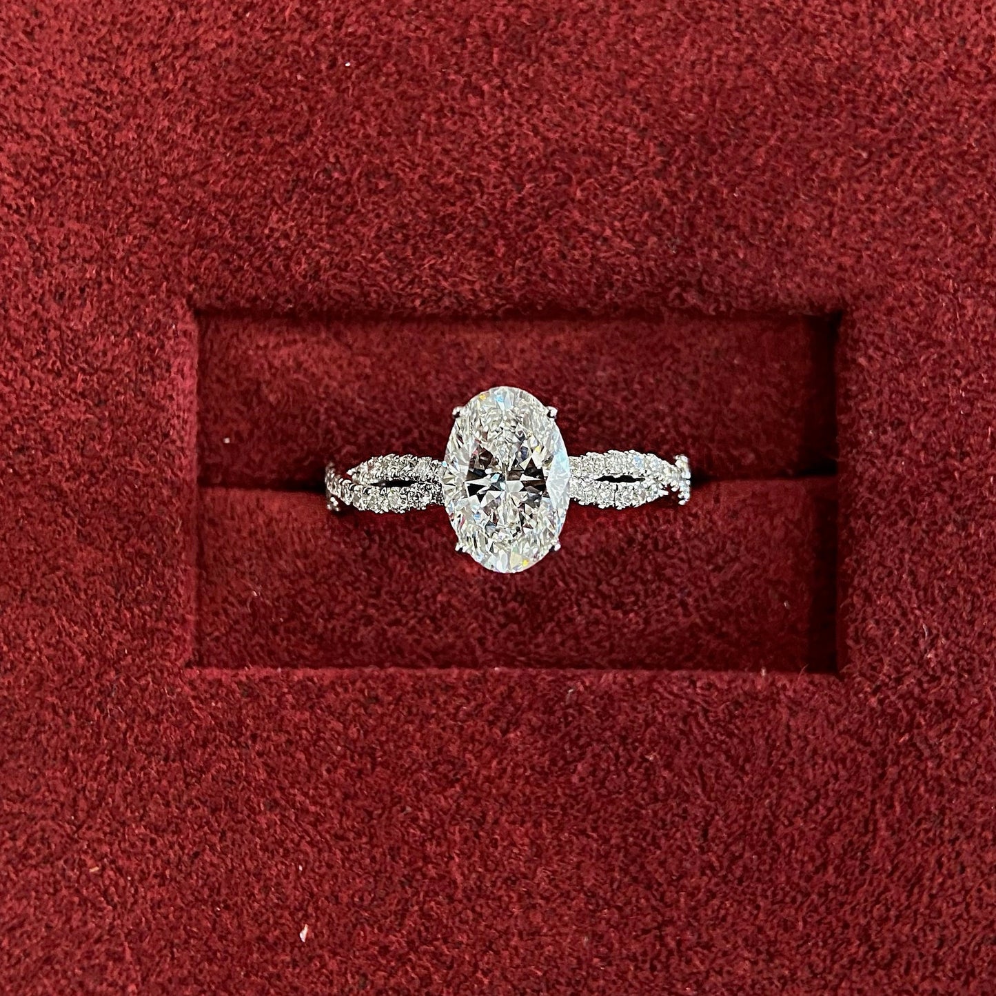 Oval cut CVD diamond twisted engagement ring