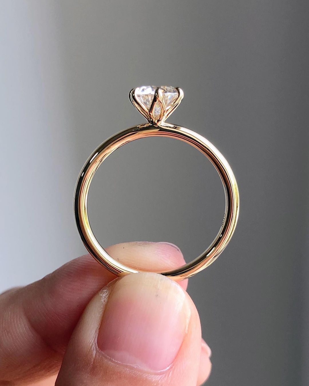 Solitaire Ring with 1.10 CT Round Cut Moissanite