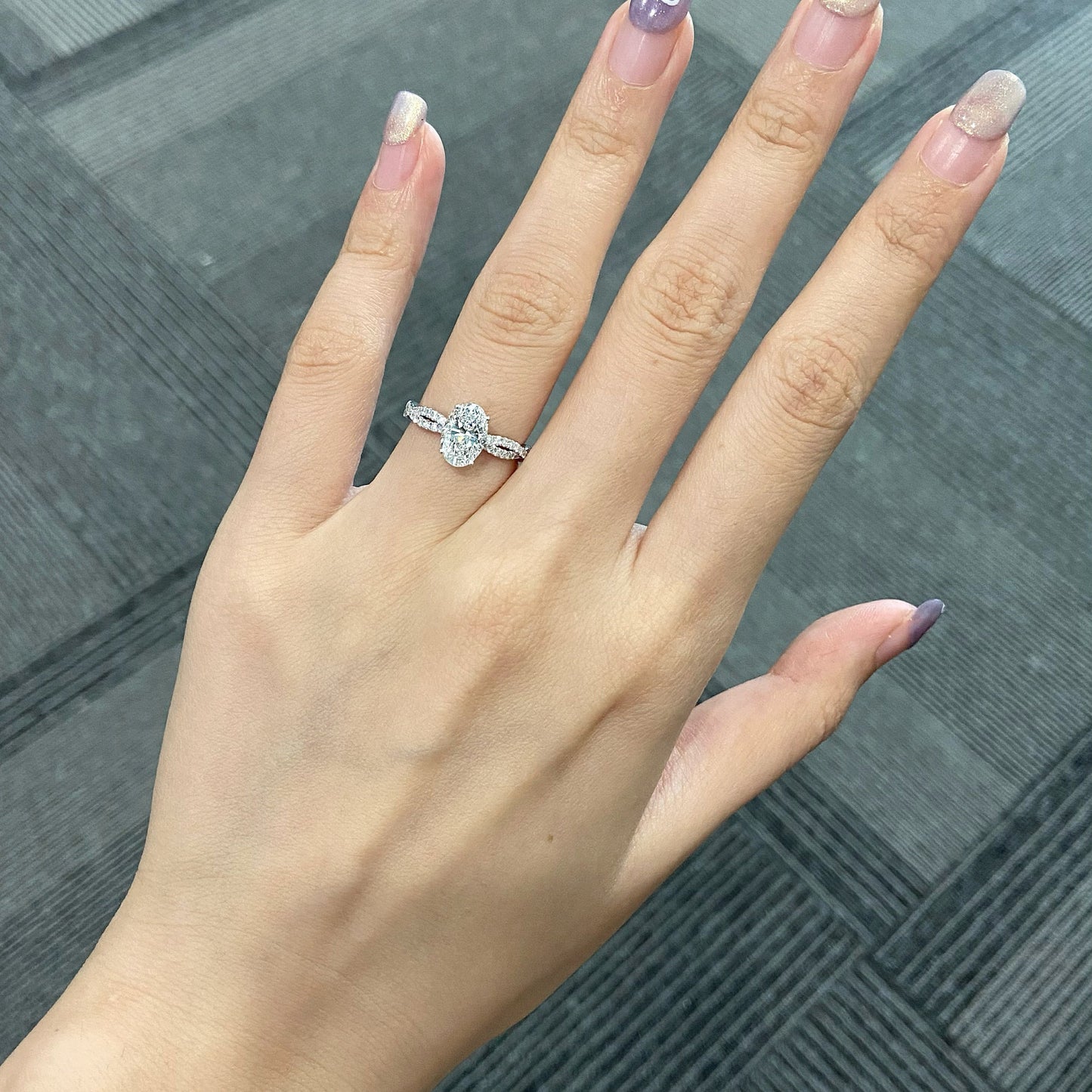 Oval cut CVD diamond twisted engagement ring