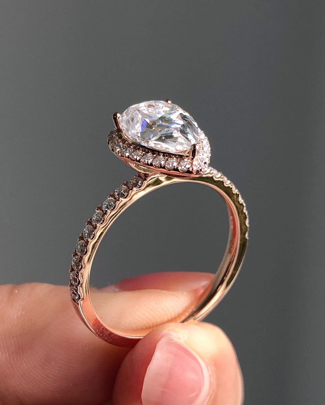 Halo & Pave Ring with 1.93 CT Pear Cut Moissanite