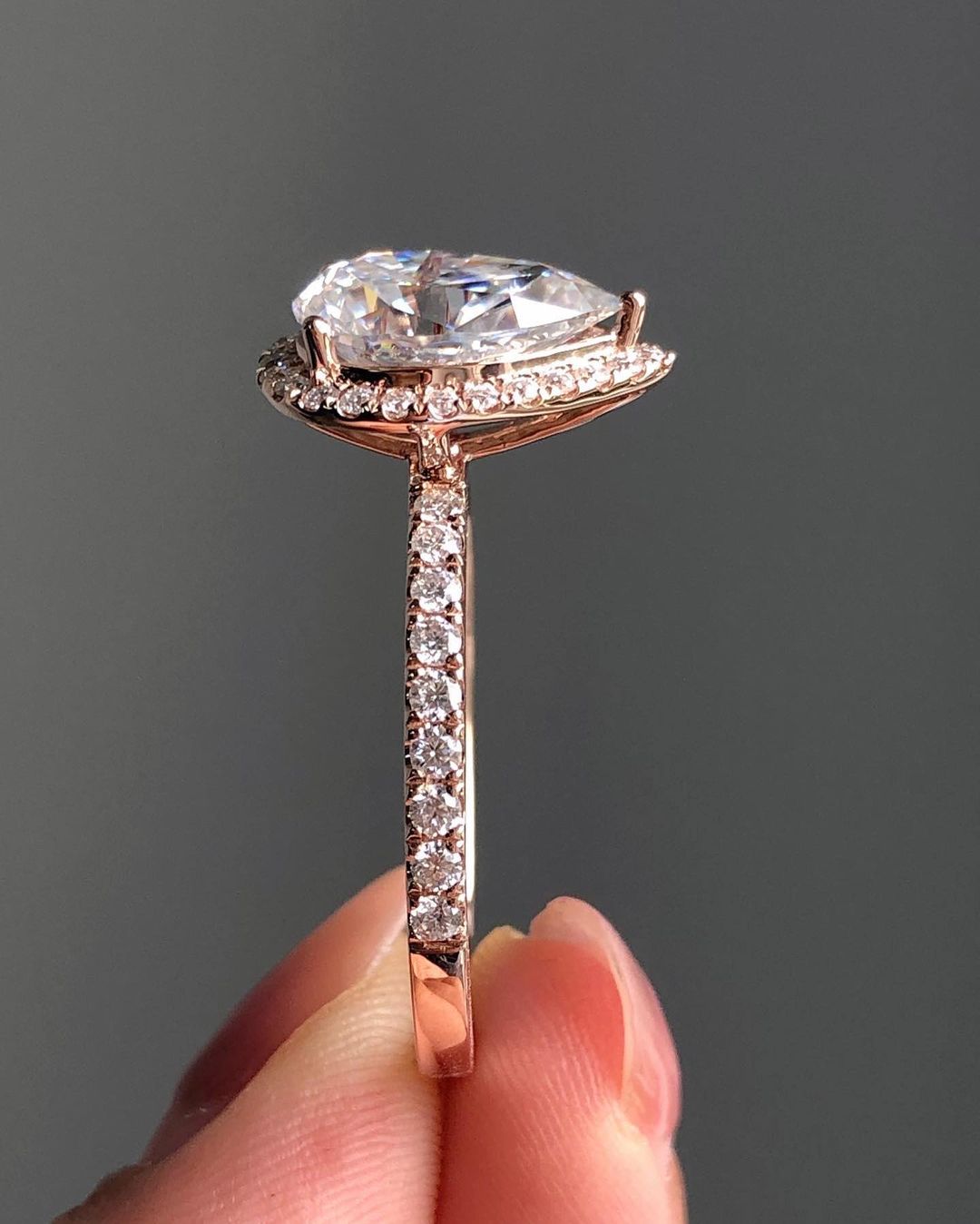 Halo & Pave Ring with 1.93 CT Pear Cut Moissanite