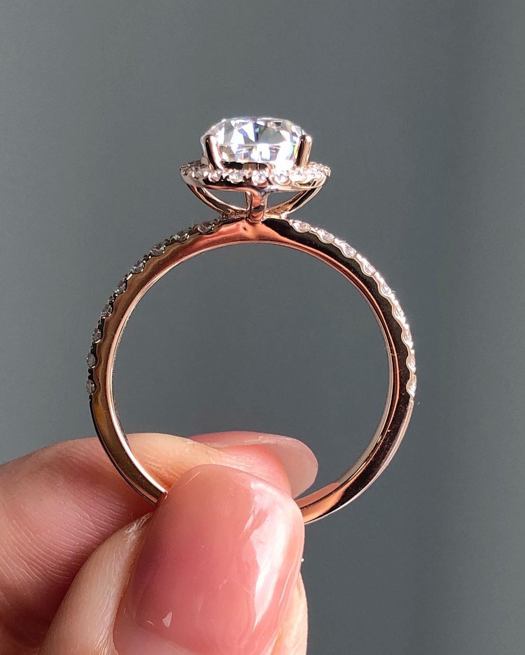 Halo & Pave Ring with 1.93 CT Pear Cut Moissanite