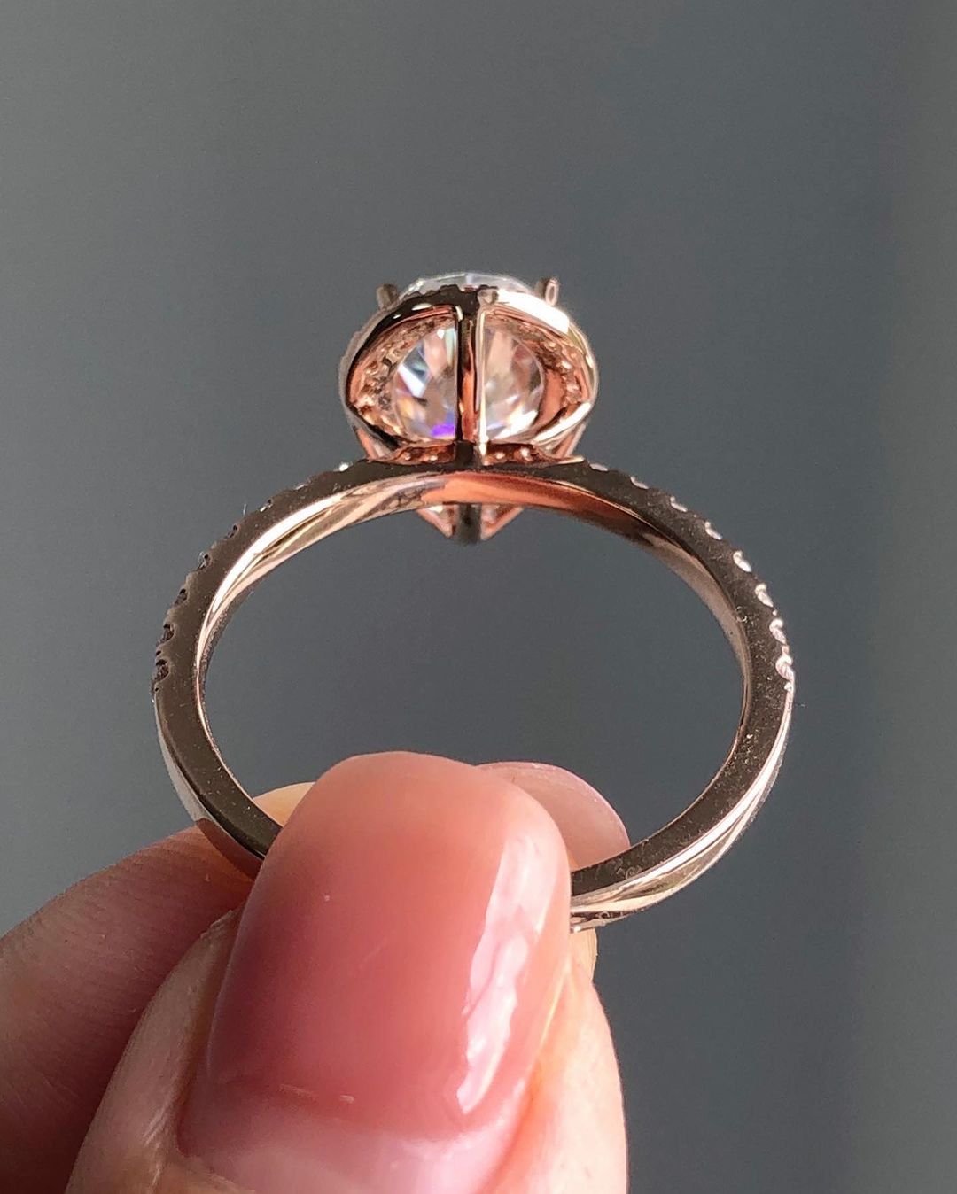 Halo & Pave Ring with 1.93 CT Pear Cut Moissanite