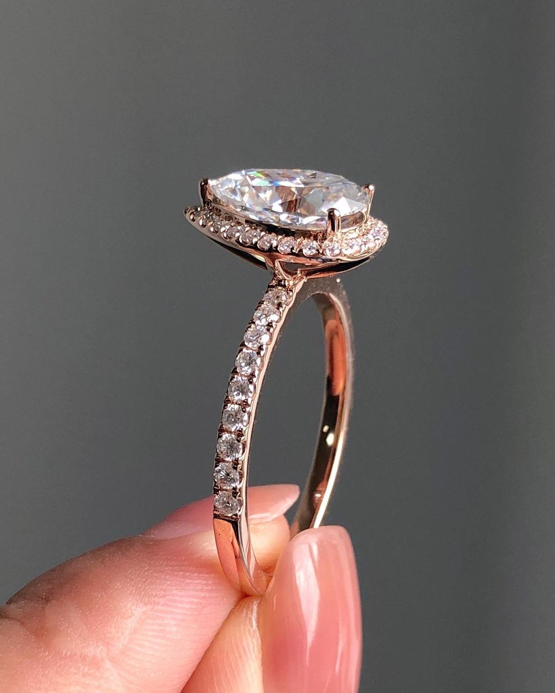Halo & Pave Ring with 1.93 CT Pear Cut Moissanite