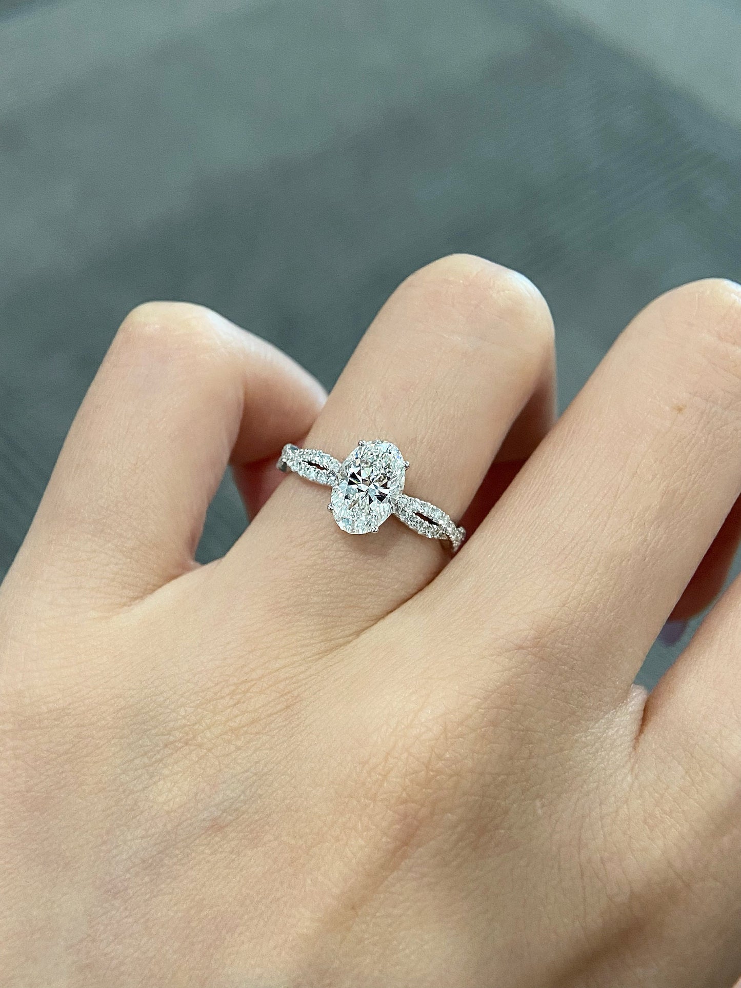 Oval cut CVD diamond twisted engagement ring