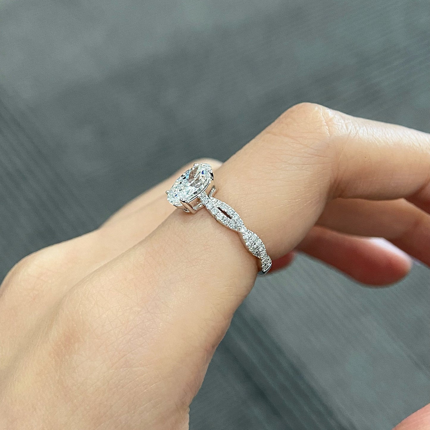Oval cut CVD diamond twisted engagement ring