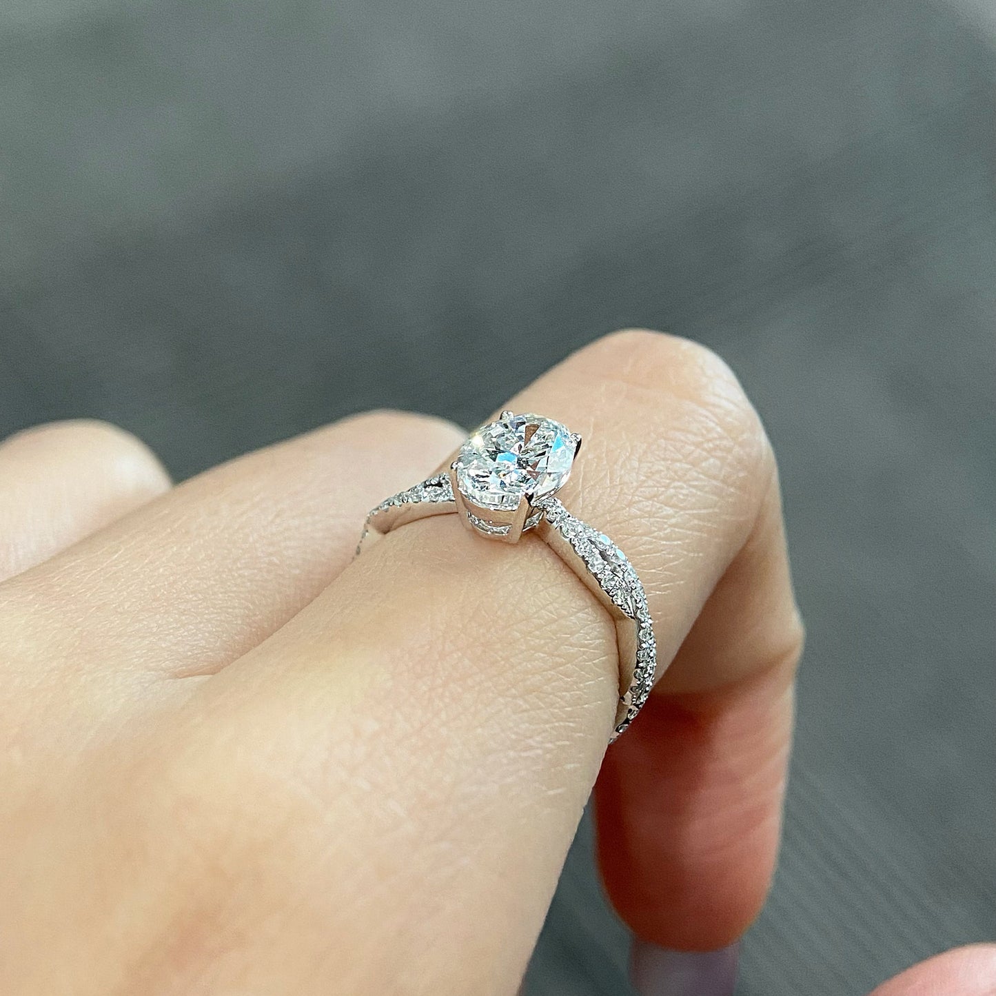 Oval cut CVD diamond twisted engagement ring