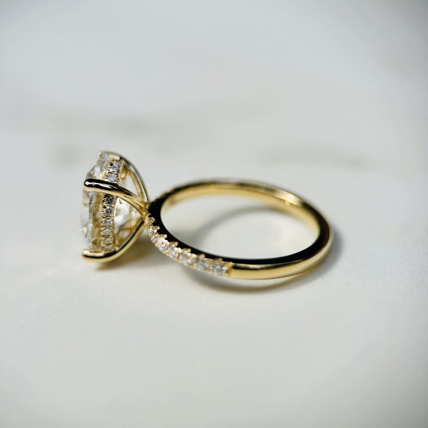 1.80 CT oval cut CVD lab grown diamond engagement ring with hidden halo, pave-set band, E color, VS1 clarity, in white gold setting