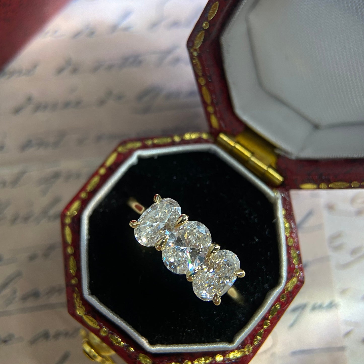Oval CVD diamond three stone engagement ring