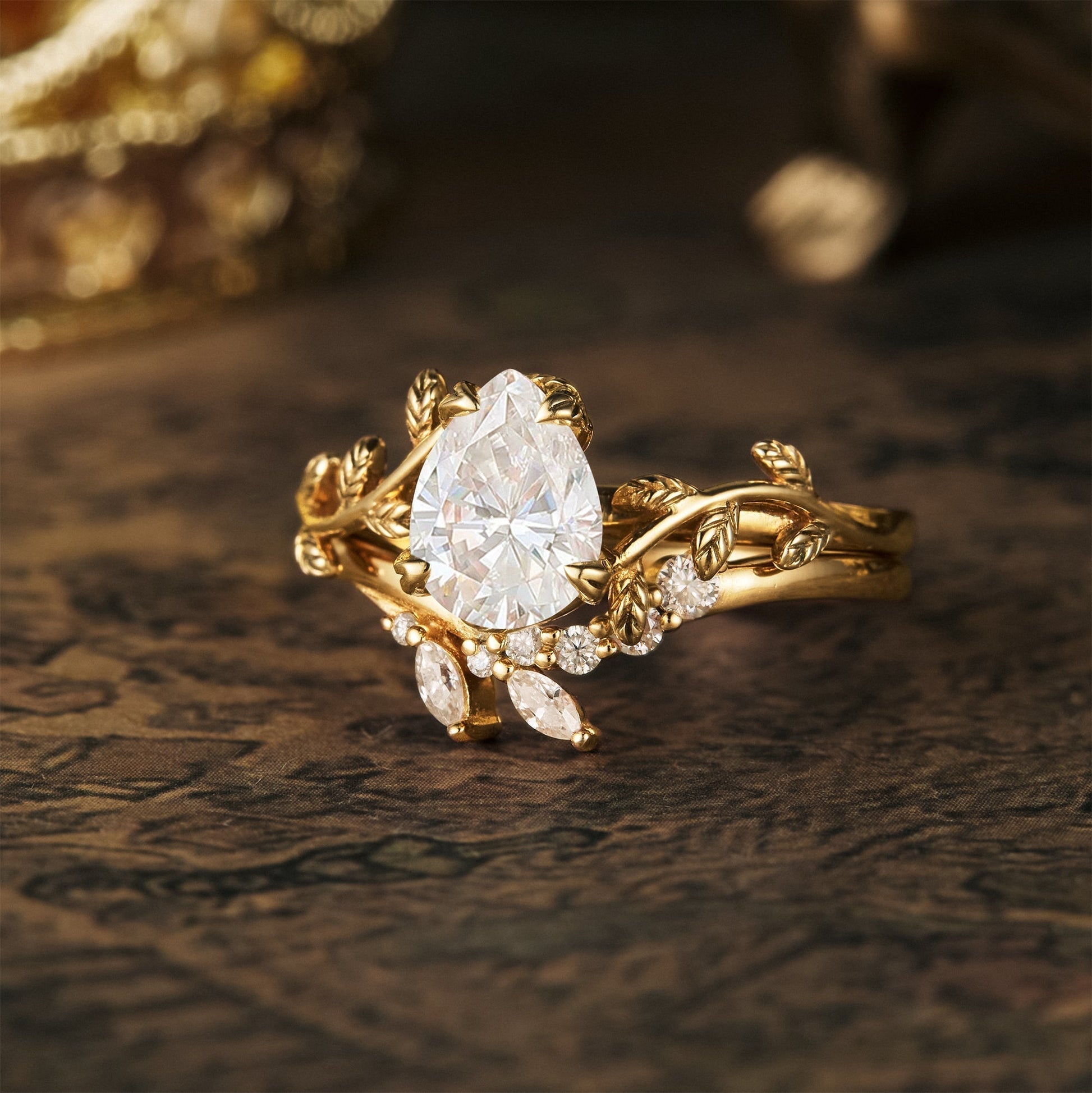 Pear shaped moissanite diamond bridal set with vintage setting