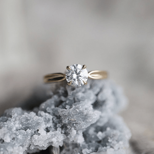 Round cut moissanite solitaire engagement ring