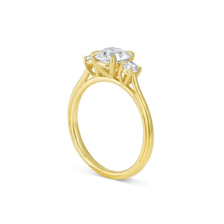 Three stone engagement ring with round cut moissanite
