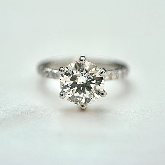 Round cut CVD lab grown diamond pave engagement ring with elegant sparkle