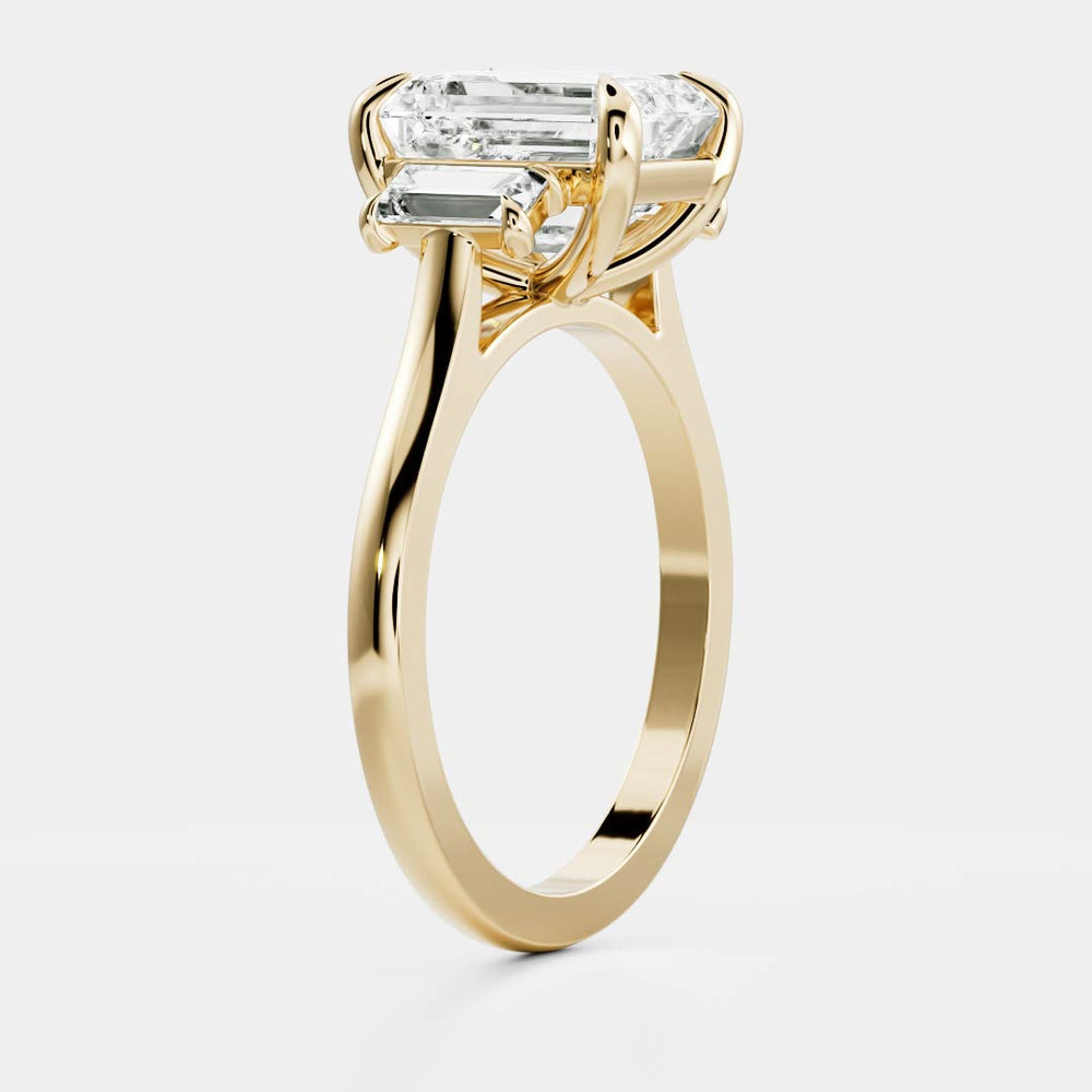 Three stone emerald moissanite engagement ring