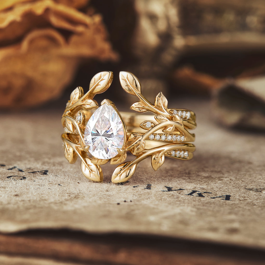 Pear shaped moissanite diamond bridal set with vintage setting