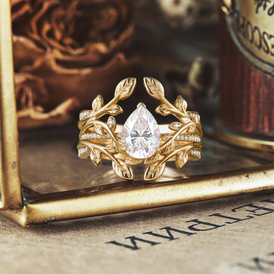 Pear shaped moissanite diamond bridal set with vintage setting