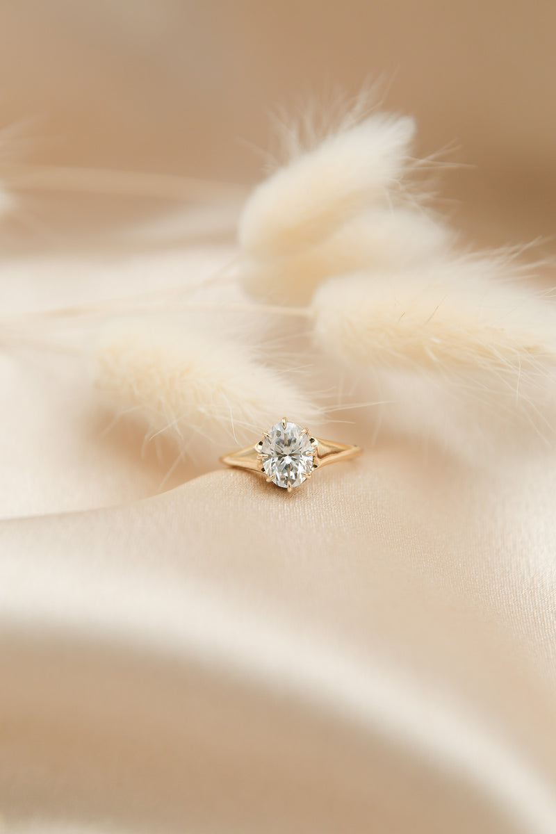 Oval cut moissanite solitaire engagement ring