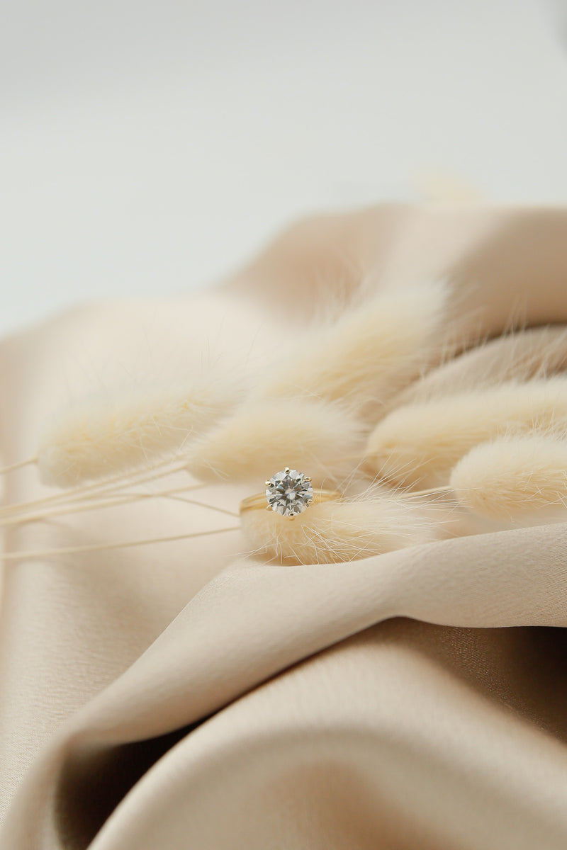 Round cut moissanite solitaire engagement ring
