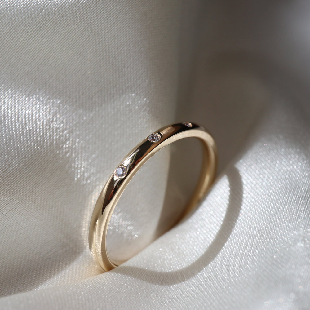 Flush Band with 0.010 TCW Round Cut Moissanite