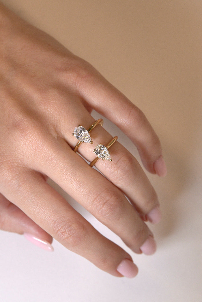 Solitaire Ring with 1.0 CT Pear Cut Moissanite