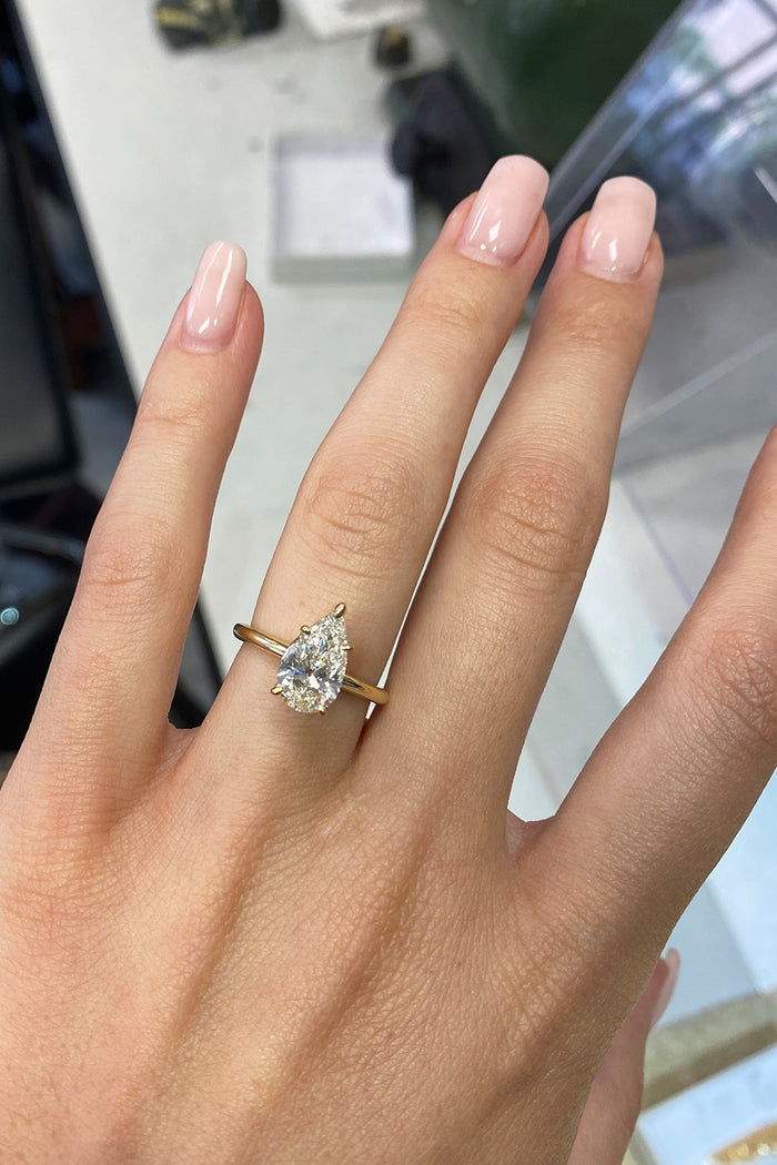 Solitaire Ring with 1.0 CT Pear Cut Moissanite