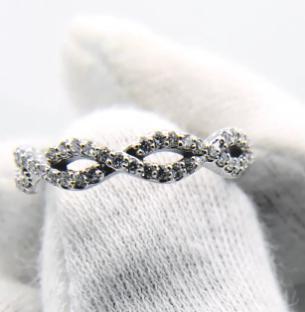 Twisted Wedding Band with 0.40 TCW Round Cut Moissanite