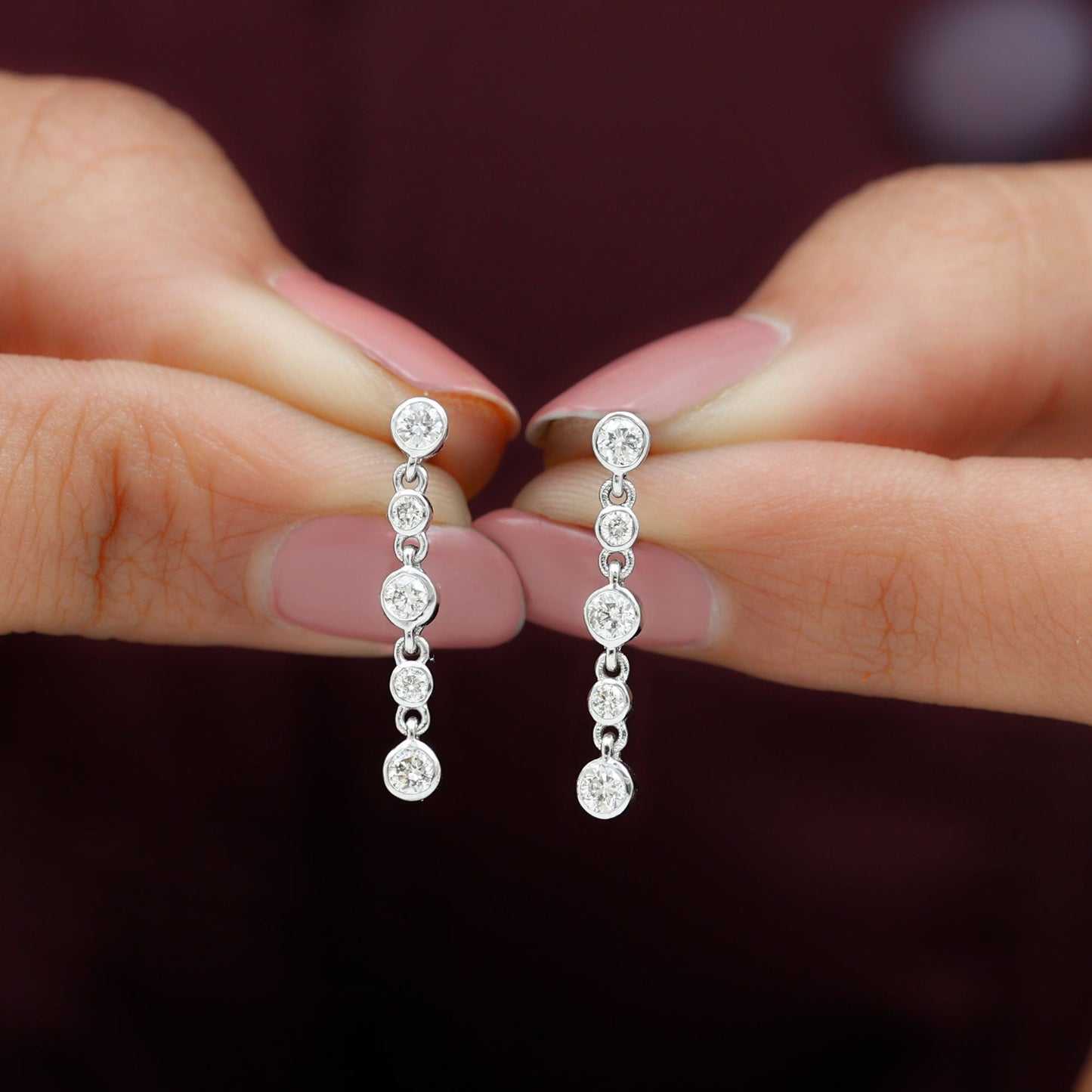 Dangle Bezel Setting Stud Earrings with 0.75 TCW Round Cut Moissanite