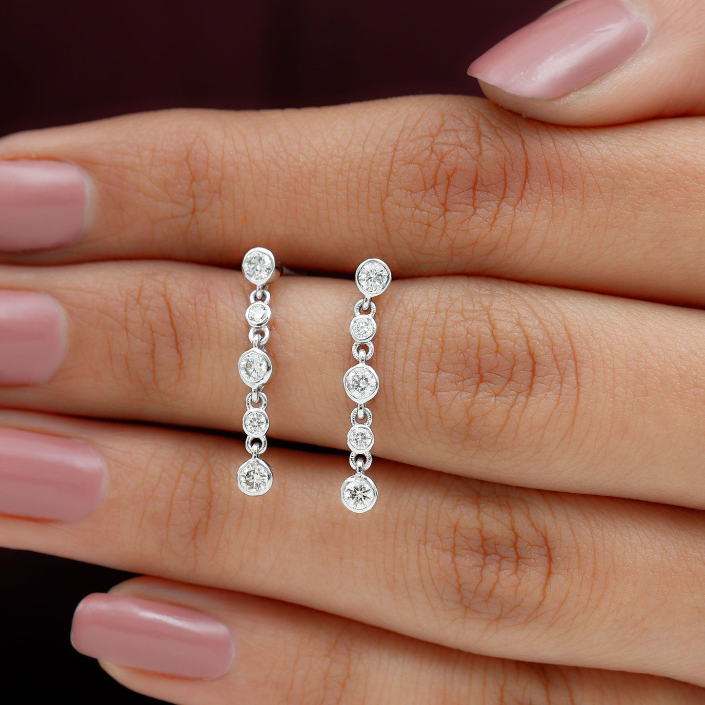 Dangle Bezel Setting Stud Earrings with 0.75 TCW Round Cut Moissanite