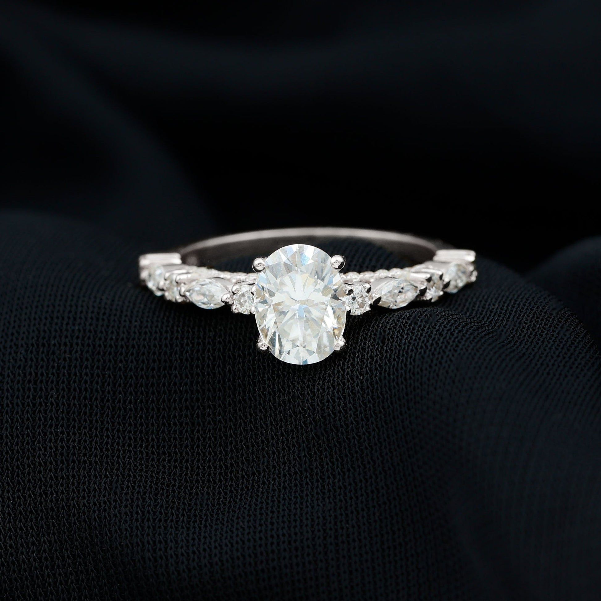 Oval cut moissanite pave engagement ring with sparkling band
