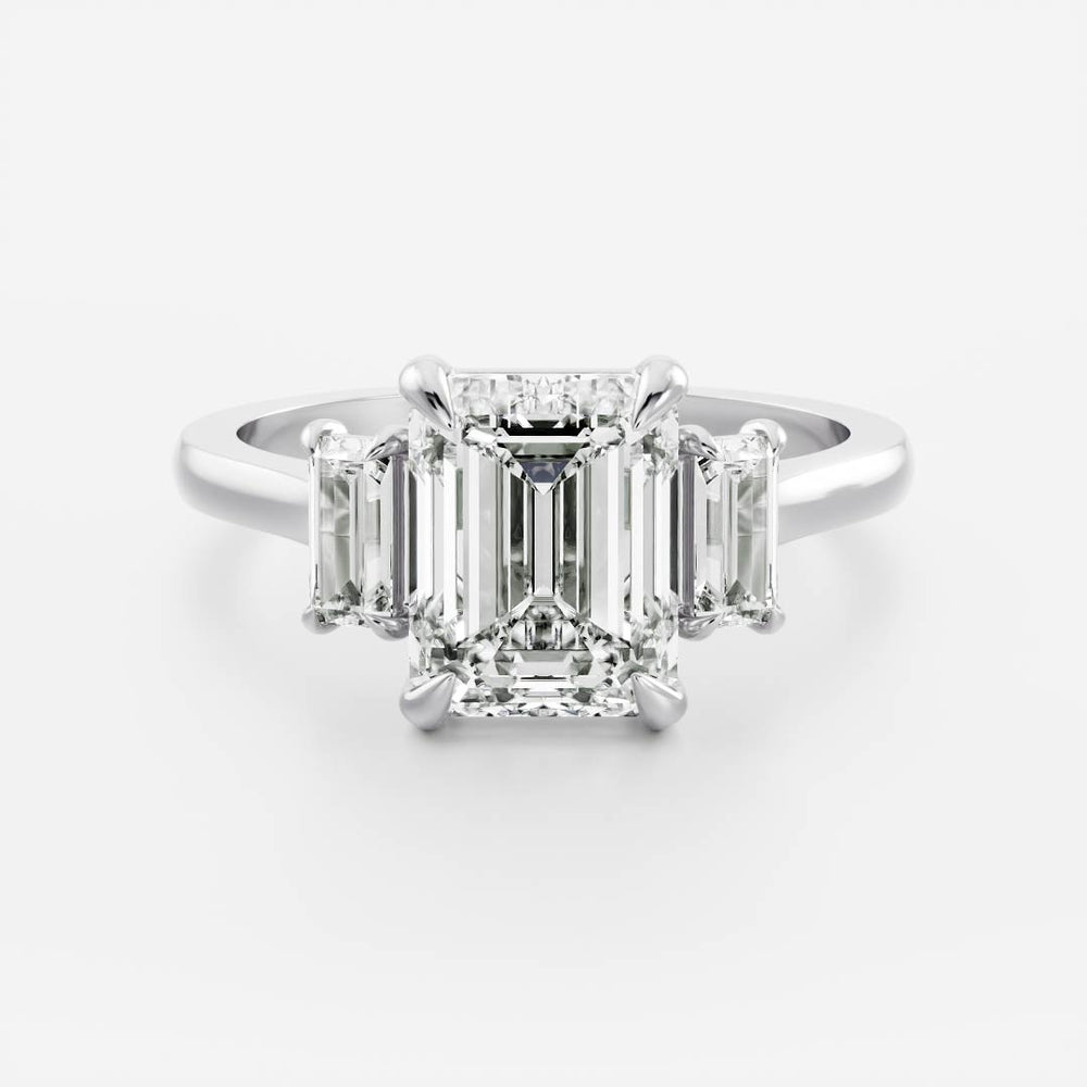 Three stone emerald moissanite engagement ring