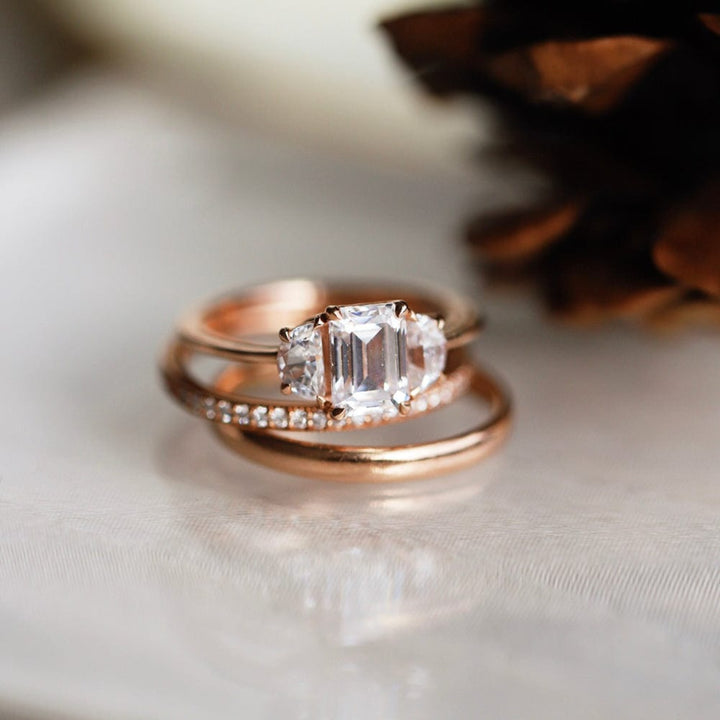 Three stone engagement ring with round cut moissanite