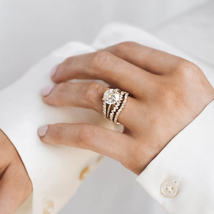 Round moissanite solitaire engagement ring in classic setting