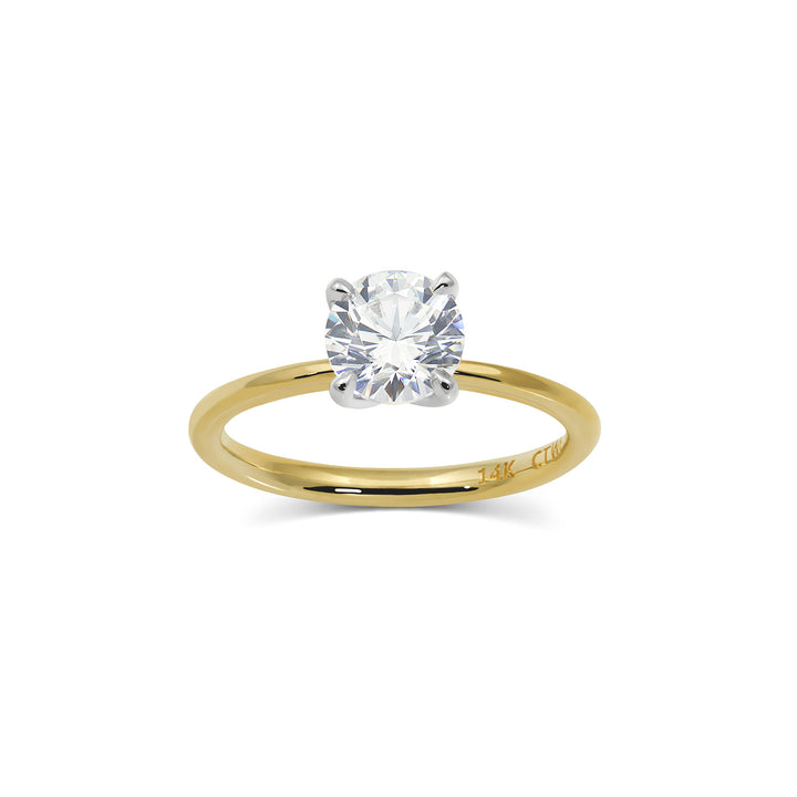 Round moissanite solitaire engagement ring in classic setting