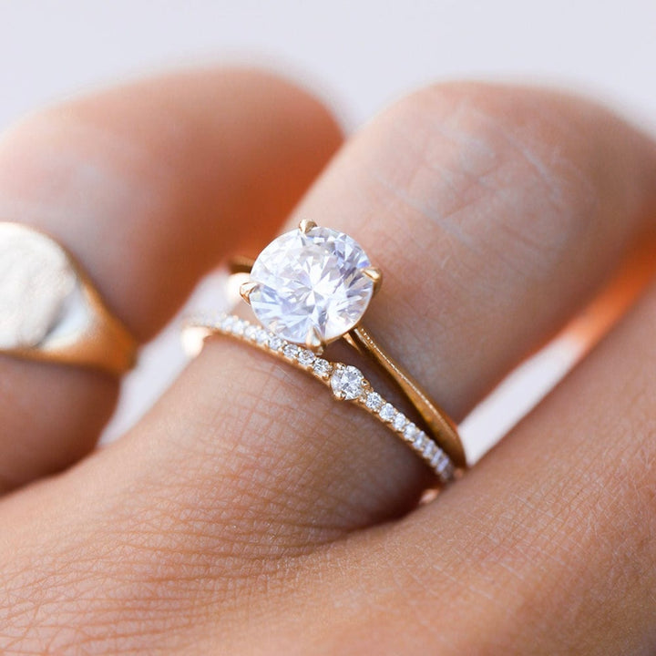 Elegant round moissanite solitaire engagement ring