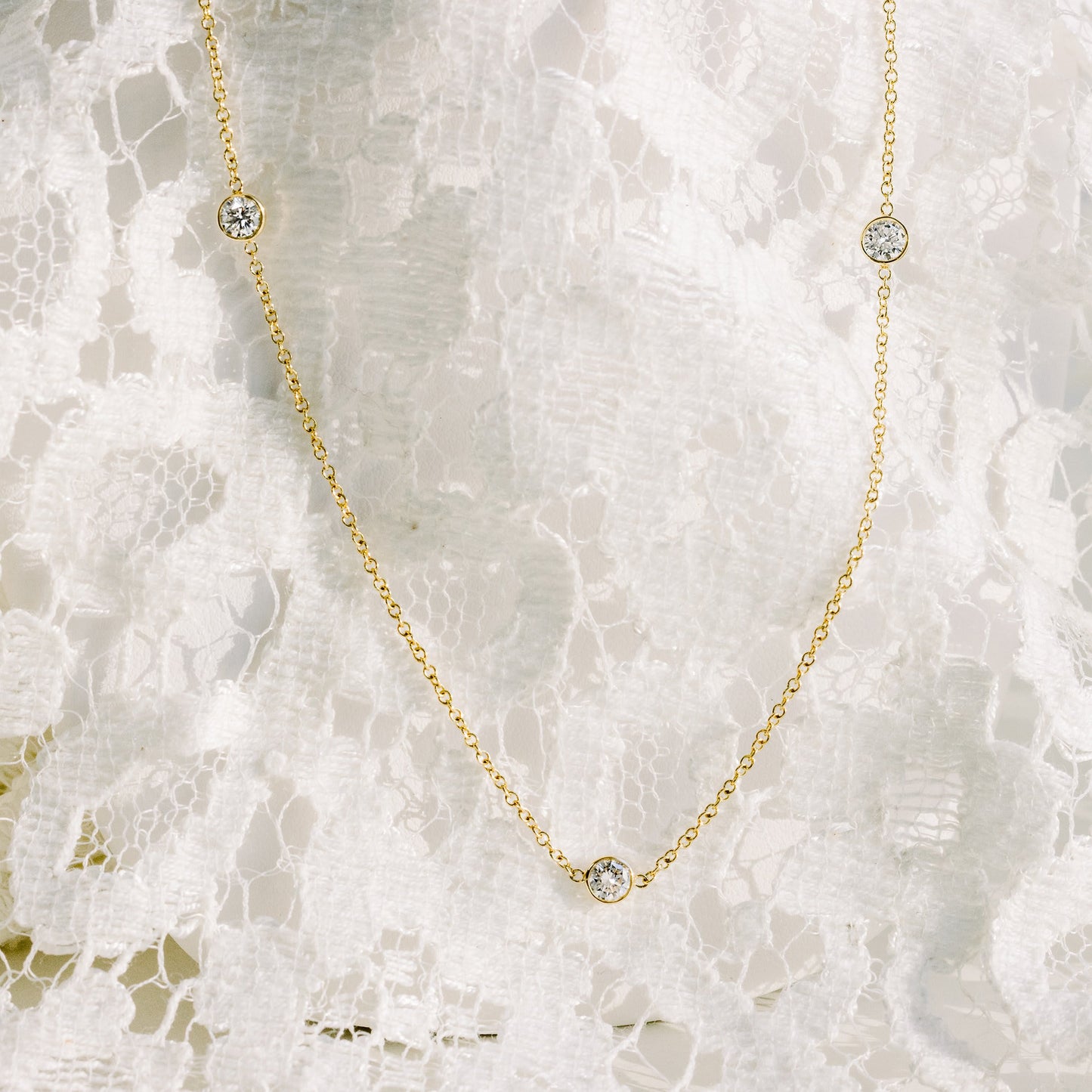 Five Bezel Necklace with 0.25 TCW Floating Cosmopolitan Round Cut Moissanite