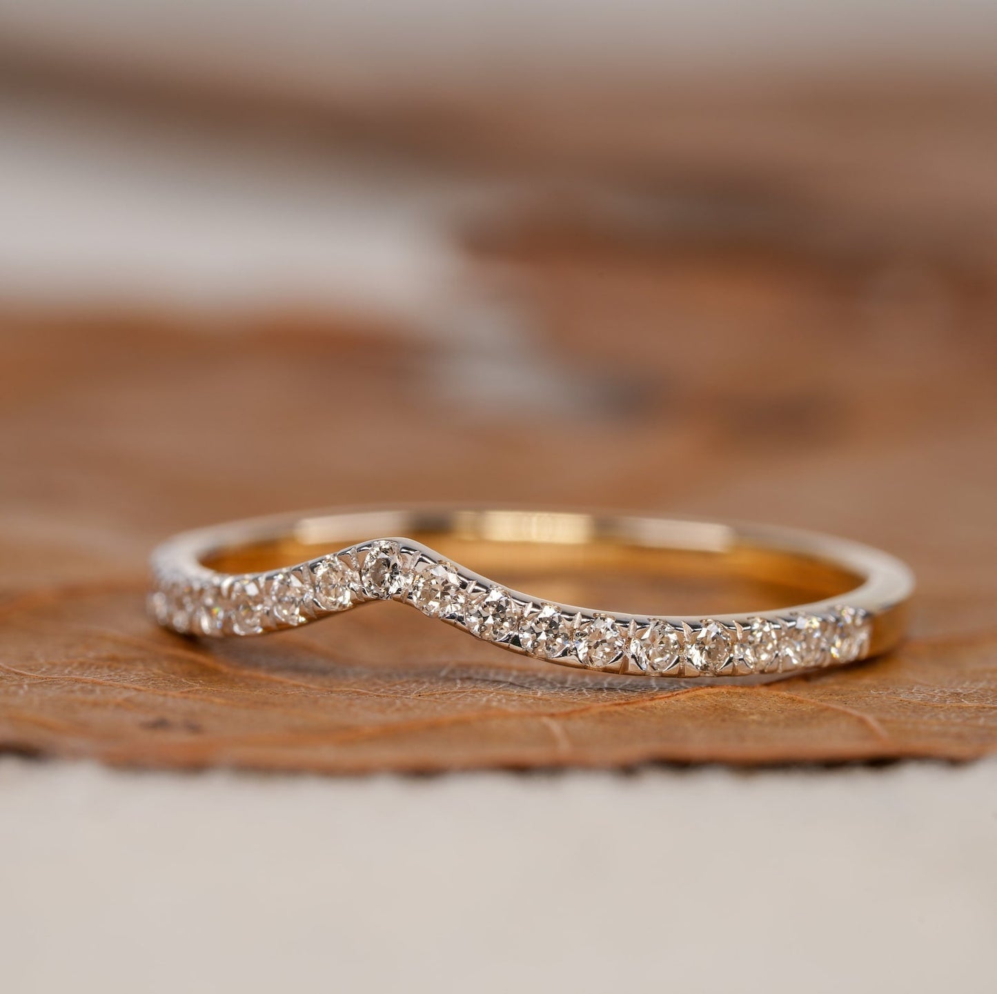 Curved Wedding Band with 0.15 TCW Round Cut Moissanite