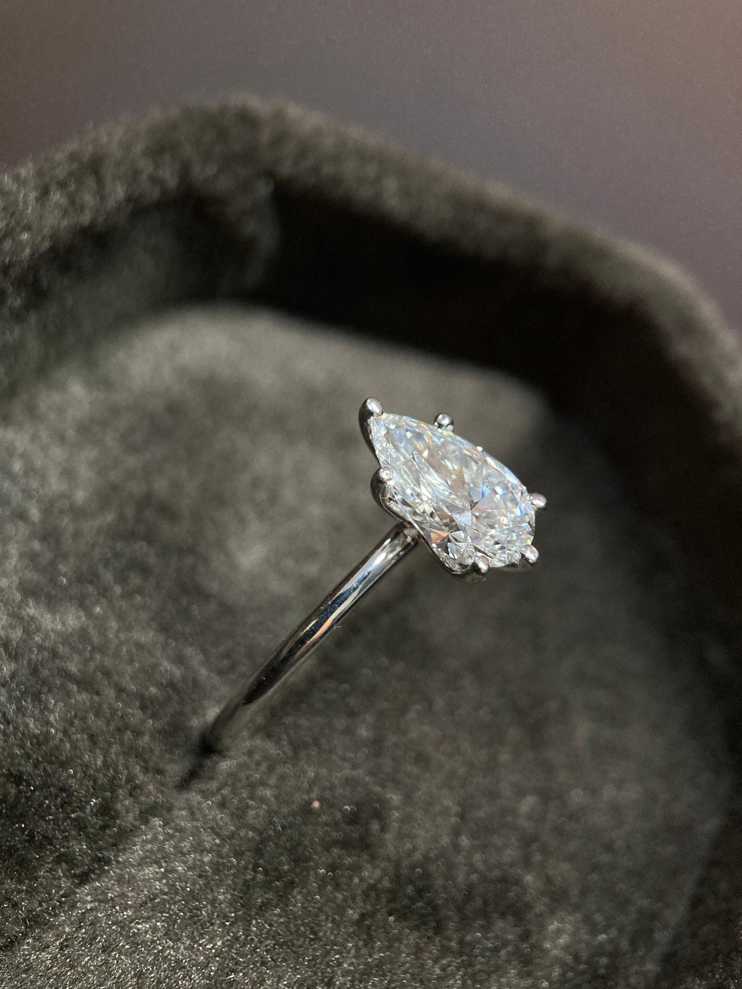 Solitaire Ring with 2.0 CT Pear Cut Moissanite