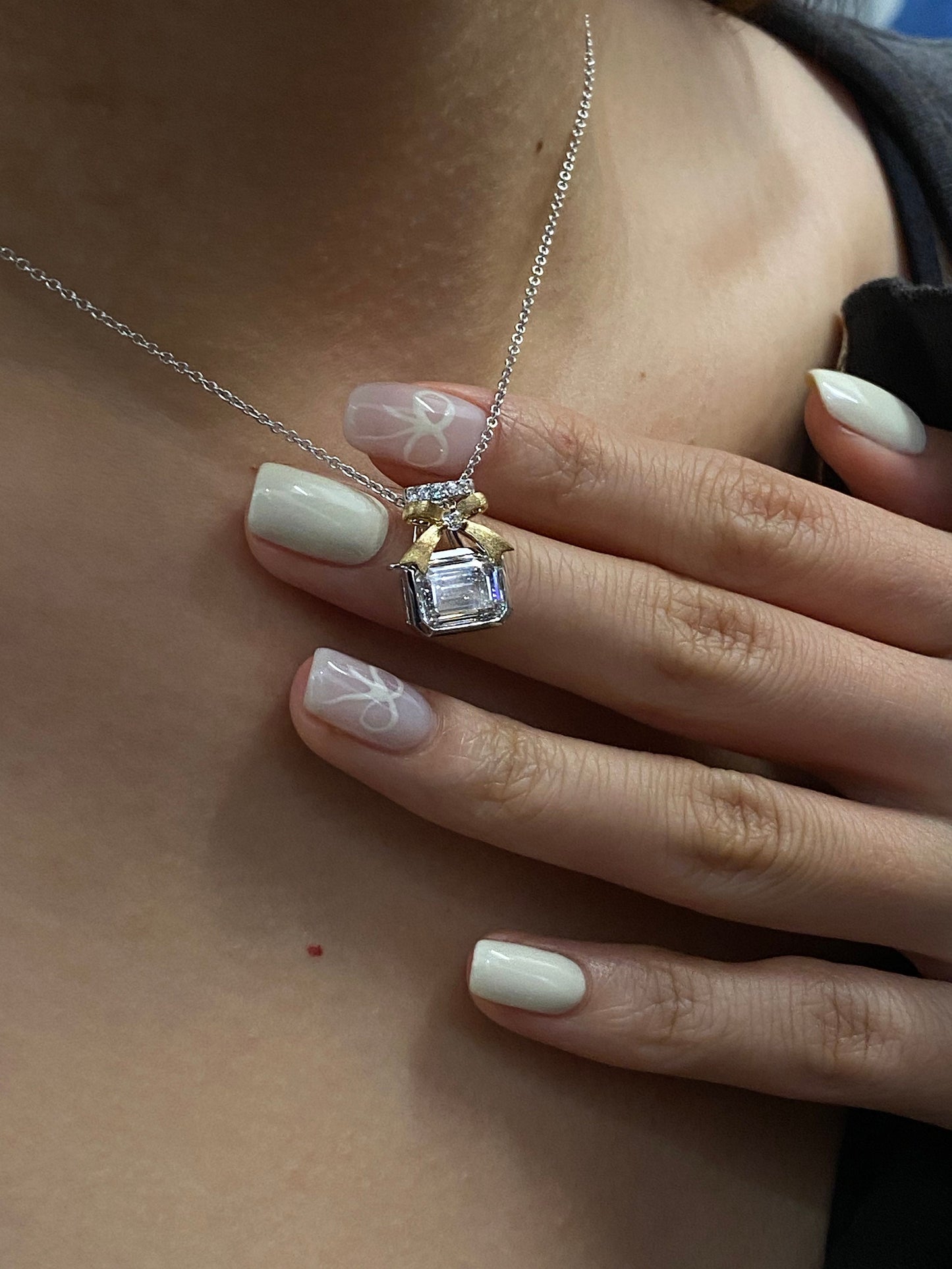 Bow Necklace with 2.0 TCW Emerald Cut Moissanite