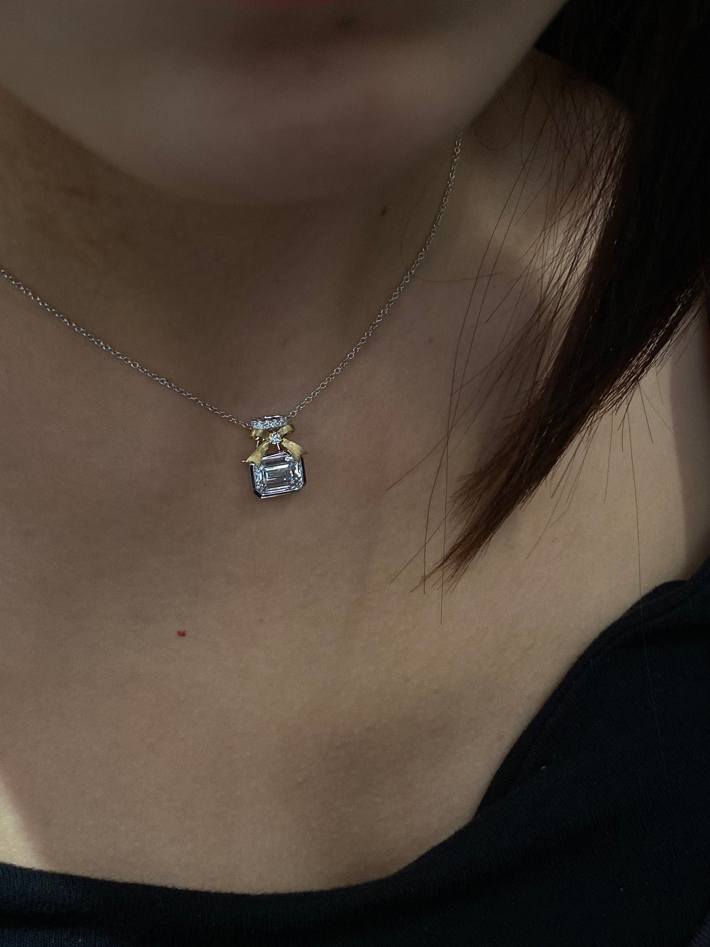 Bow Necklace with 2.0 TCW Emerald Cut Moissanite
