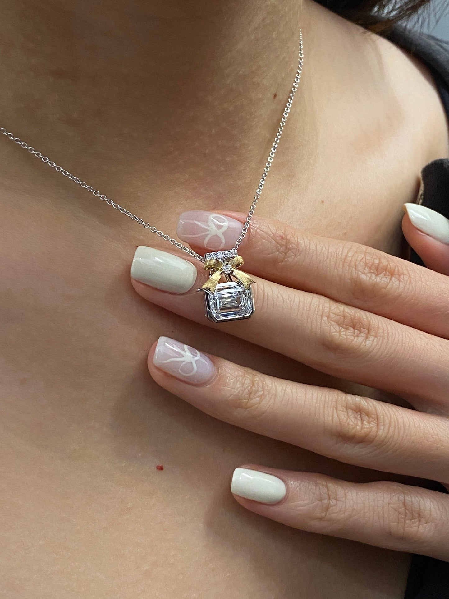 Bow Necklace with 2.0 TCW Emerald Cut Moissanite