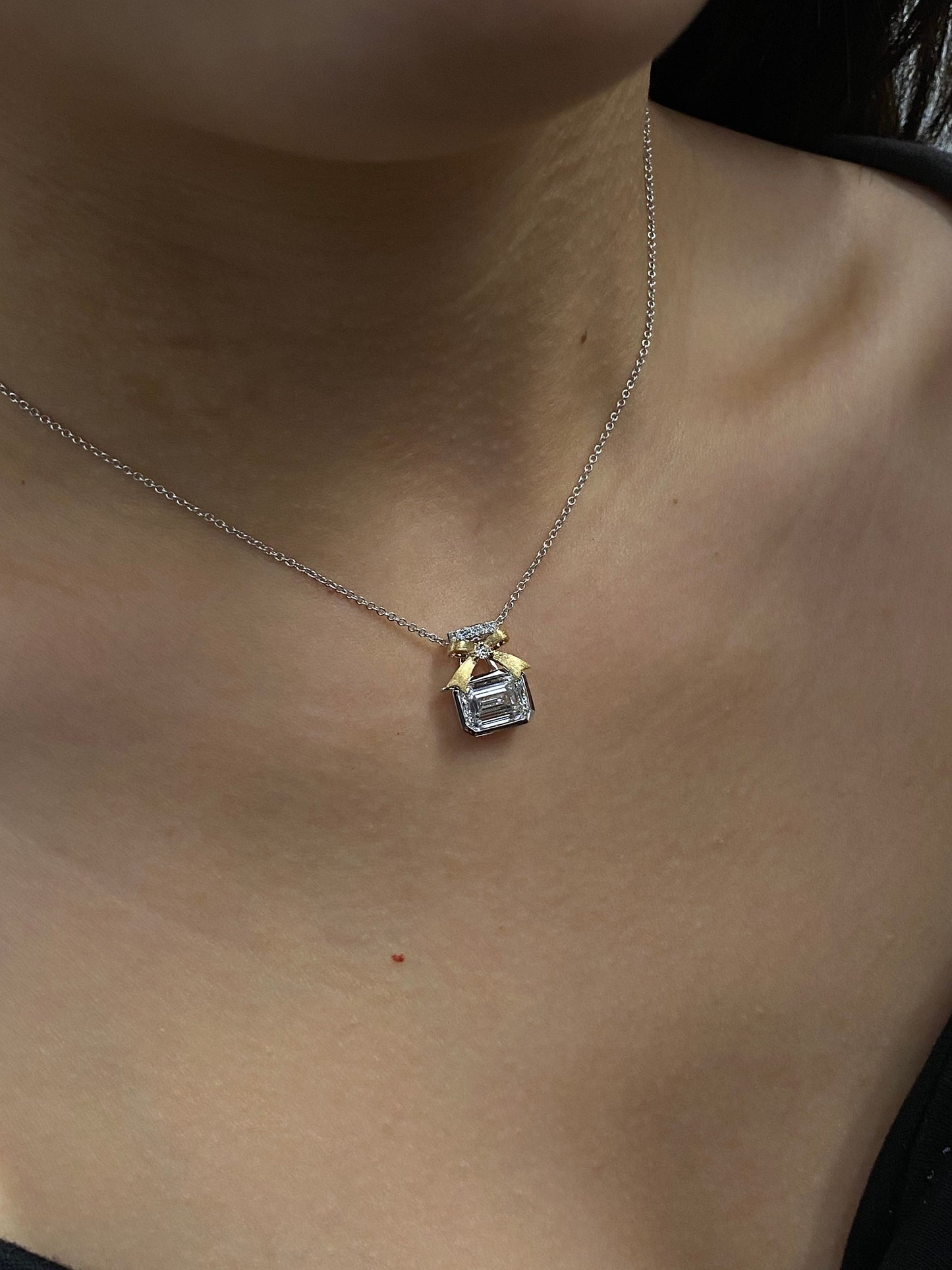 Bow Necklace with 2.0 TCW Emerald Cut Moissanite