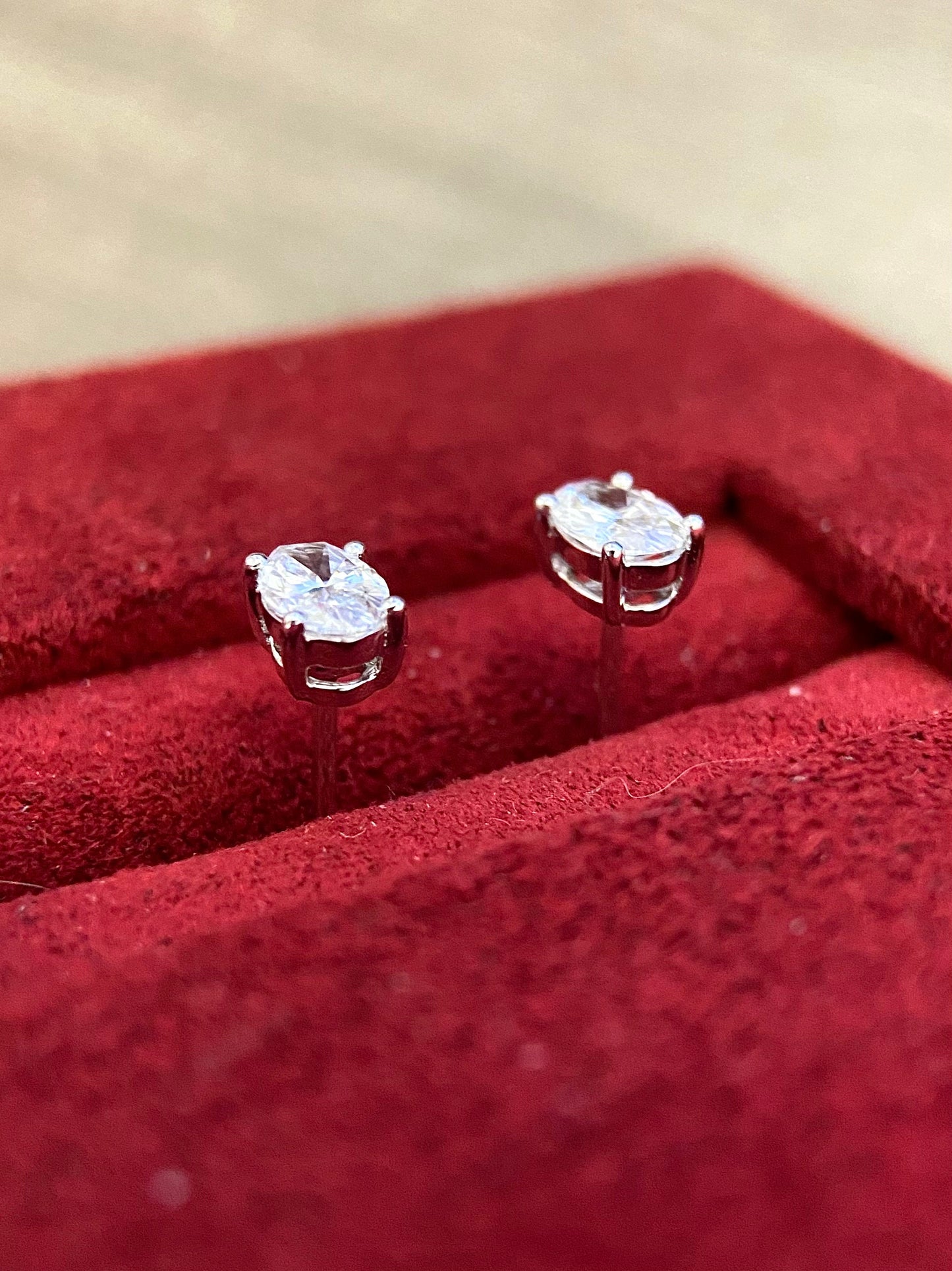 Solitaire Stud Earrings with 0.4 TCW Oval Cut Moissanite