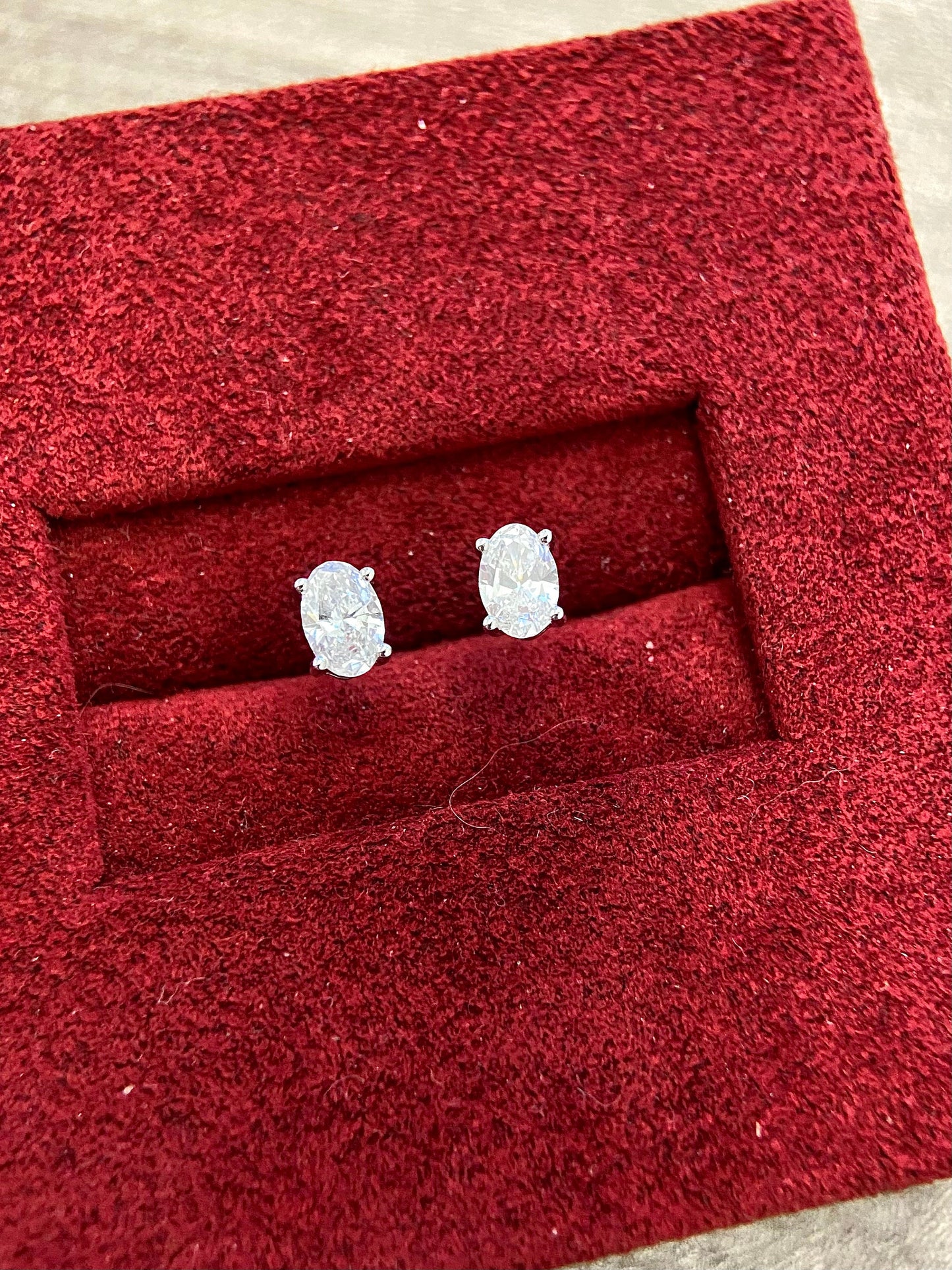 Solitaire Stud Earrings with 0.4 TCW Oval Cut Moissanite