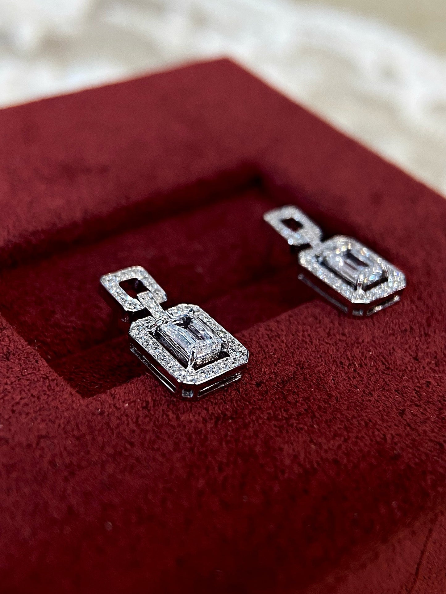 Halo Stud Earrings with 0.60 TCW Emerald Cut Moissanite