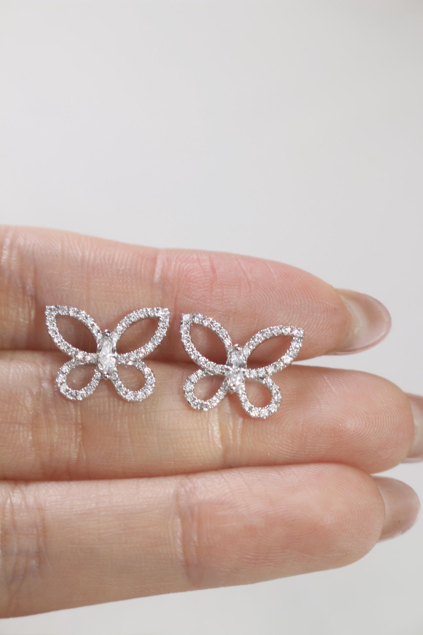 butterfly Stud Earrings with 0.50 TCW Round Cut Moissanite