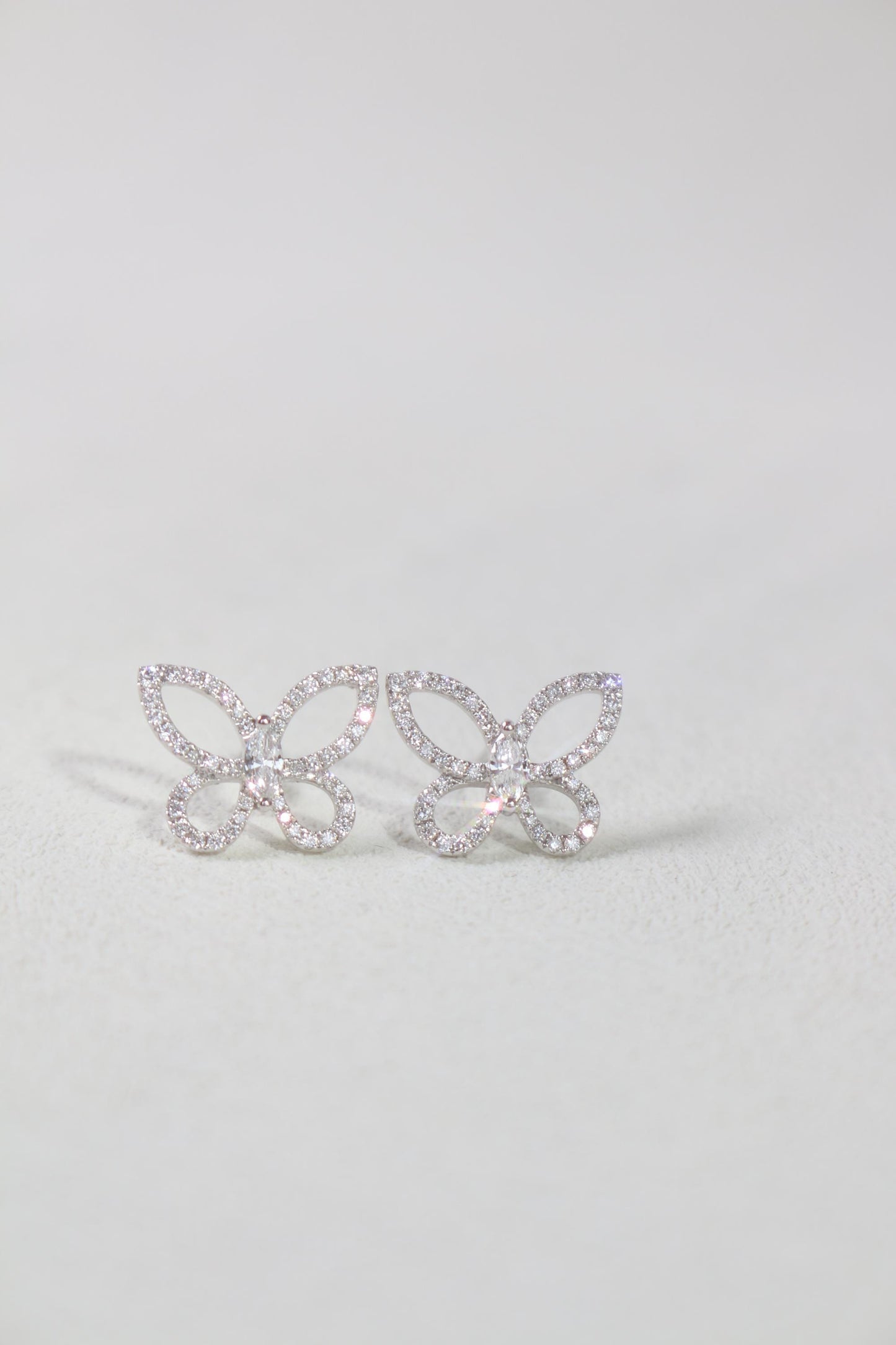 butterfly Stud Earrings with 0.50 TCW Round Cut Moissanite