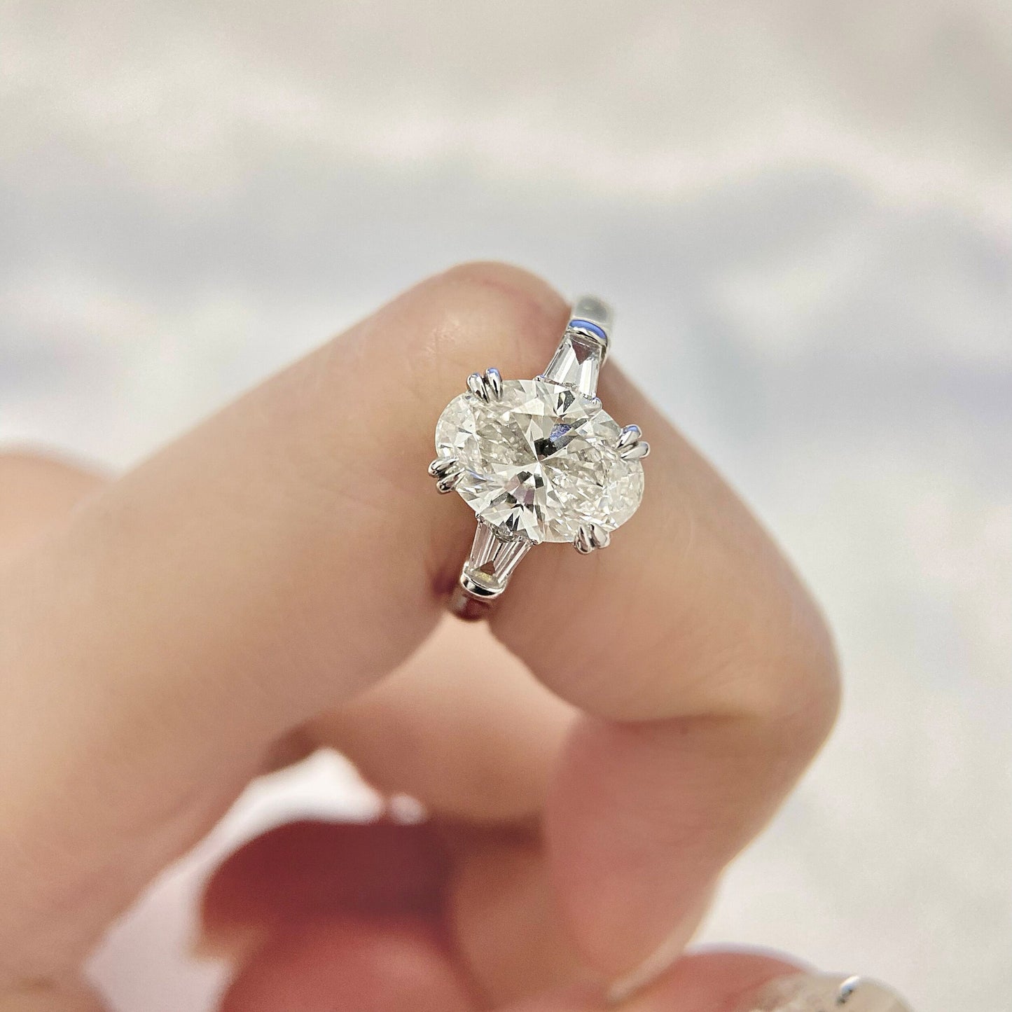 Oval cut CVD diamond three stone style engagement ring