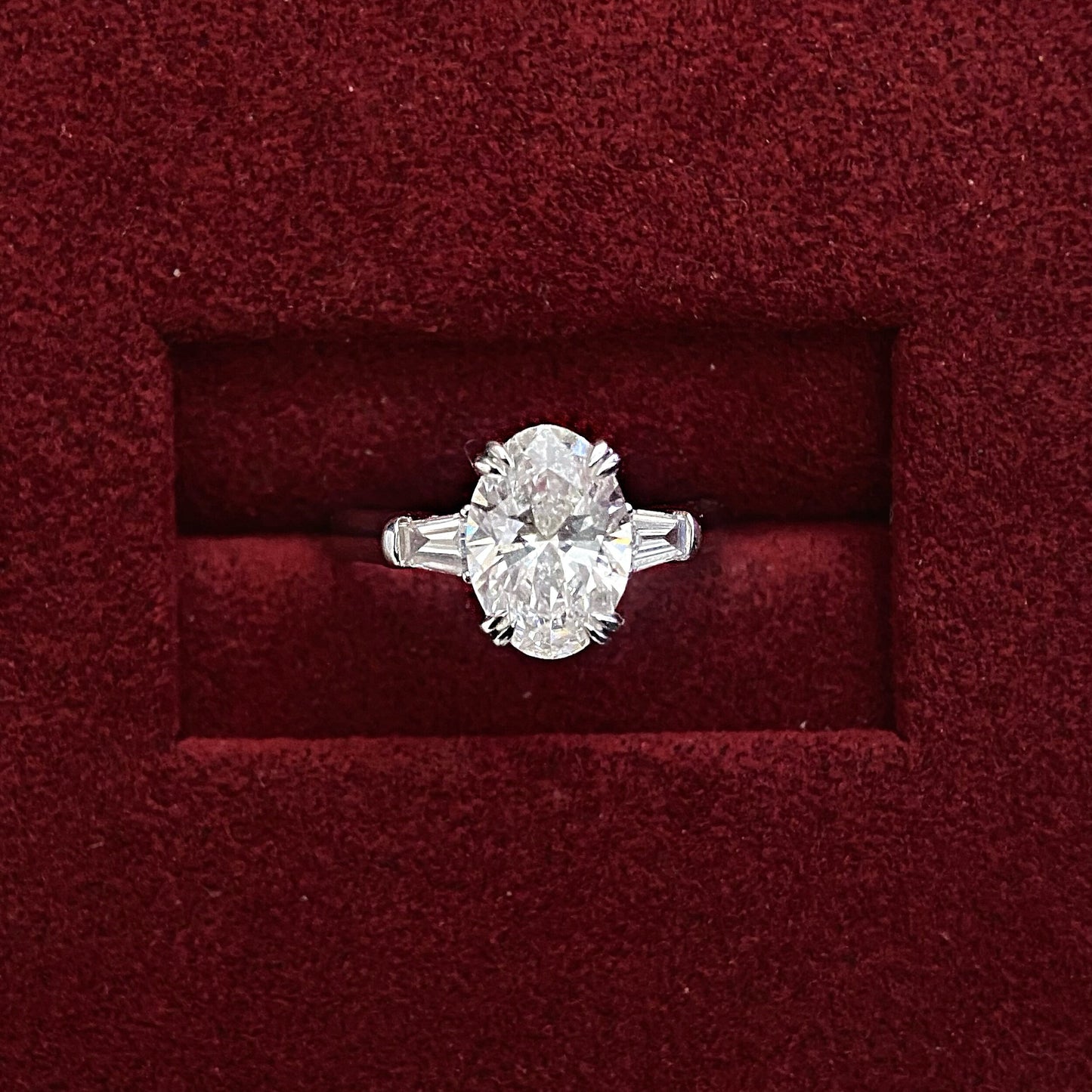 Oval cut CVD diamond three stone style engagement ring